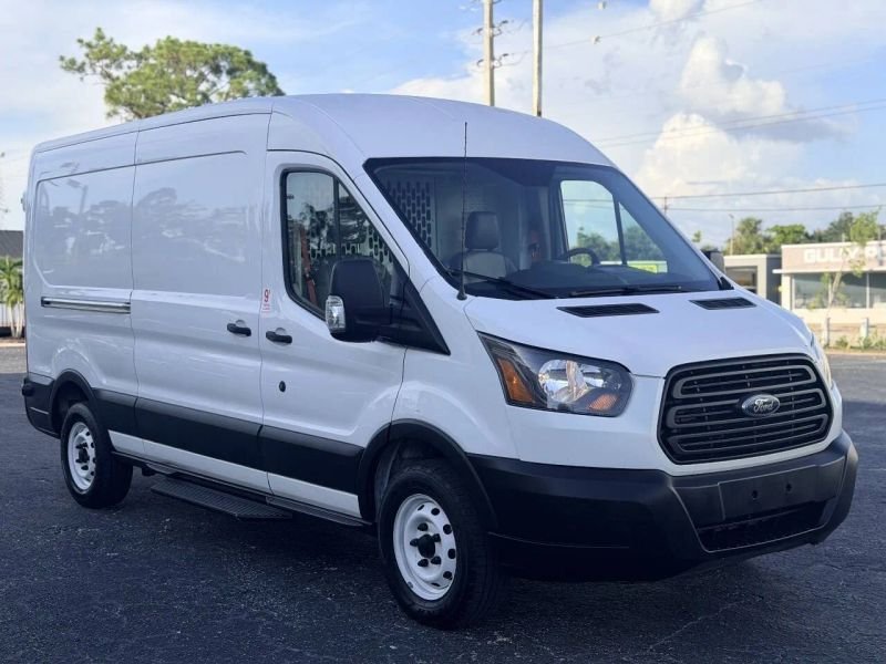 Horizontal photograph of a 2019FordTransit 150 VanMedium Roof w/Sliding Side Door w/LWB Van 3D
