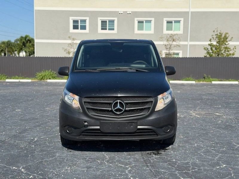 Horizontal photograph of a 2016Mercedes-BenzMetris CargoVan 2D