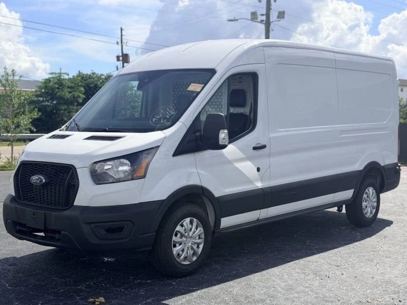 Horizontal photograph of a 2021FordTransit 150 Cargo VanMedium Roof w/LWB Van 3D